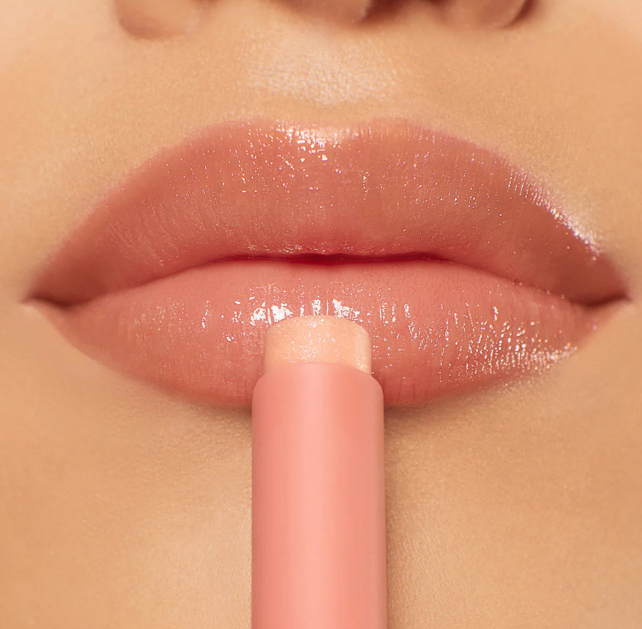 Glossy Gossip Shimmer Lip Plump Balm