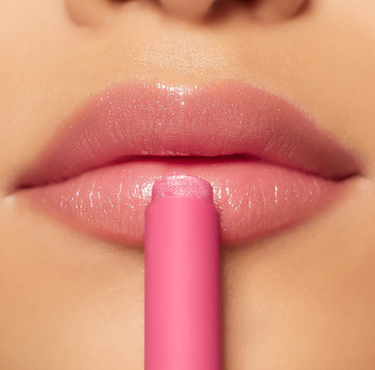 Glossy Gossip Shimmer Lip Plump Balm